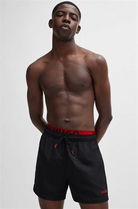 HUGO - Logo-print swim shorts with double waistband - Black