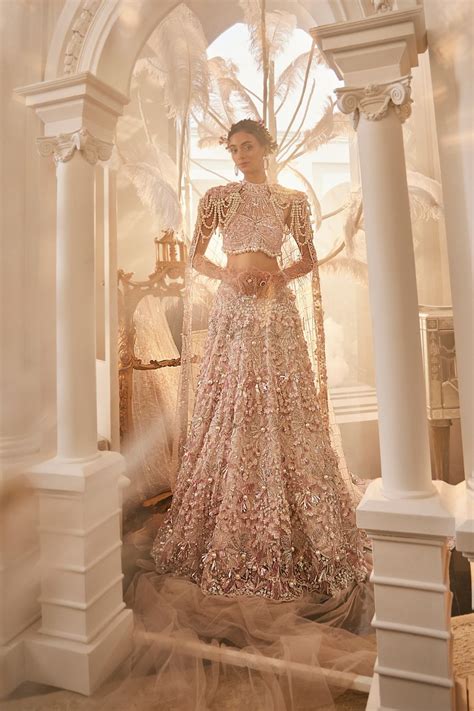 Juventas Baby Pink Embellished Net Lehenga and Halter Blouse with Trai ...