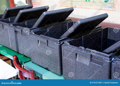 Row of Black Styrofoam Insulated Coolers, Ice Chest Stock Image - Image ...