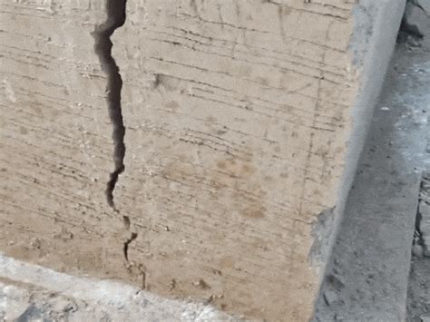 Cracks in the foundation walls of a large hoarding structure on Iconic ...