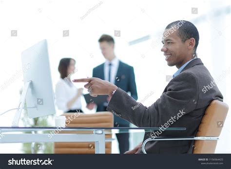 Business Man Pointing at Computer 的图像结果