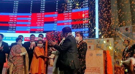 Yogi Adityanath rings bell at BSE for listing bond of LMC