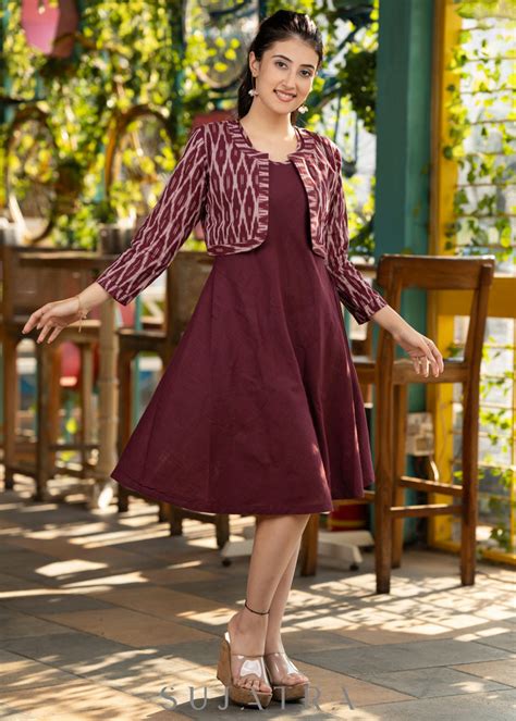 Trendy wine cotton flared dress paired with contrast ikat shrug – Sujatra