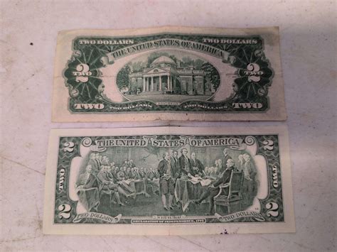 1935 silver dollar bill and (2) 2-dollar bills - Kaufman Realty & Auctions