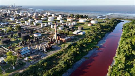 River near Buenos Aires turns red, amid fears of toxic pollution ...