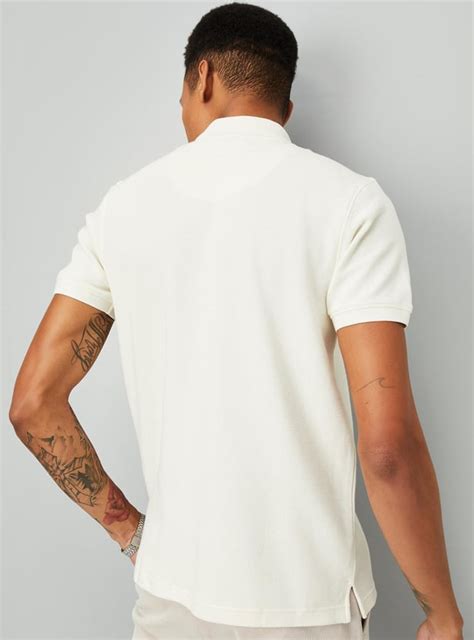 Buy Men Textured Zipper Polo T-shirt Online at just Rs. 699.0 ...