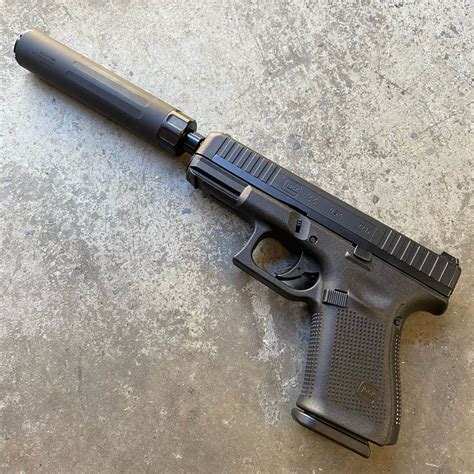 GLOCK 44 .22 caliber pistol, threaded barrel package. 3X 10 round mags ...