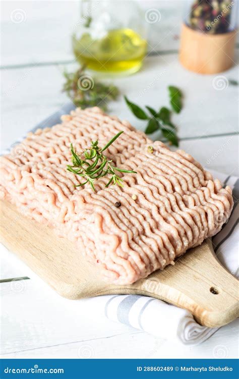 Raw Ground Turkey with Rosemary and Spices. Wooden on a White Background. Stock Image - Image of ...