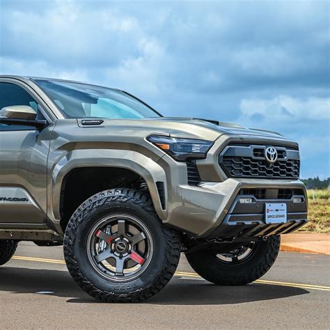 Lifted Toyota Tacoma Looks Great Even in Bronze When Dressed Properly With Graphite Wheels ...