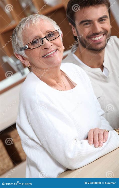 Young man with older woman stock photo. Image of portrait - 25358050