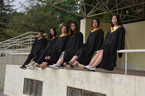 Black graduates wear black suits on graduation day at university ...