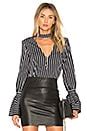 L'Academie The Felix Blouse in Black Striped | REVOLVE