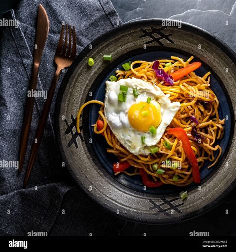 Egg fried noodles hi-res stock photography and images - Alamy
