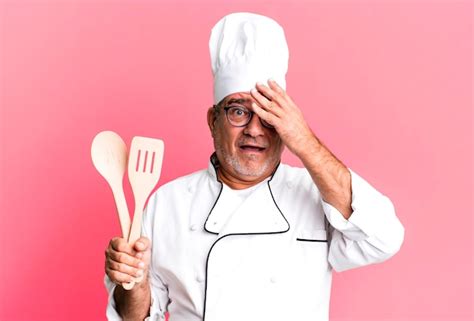 Looking shocked scared or terrified covering face with hand | Premium Photo
