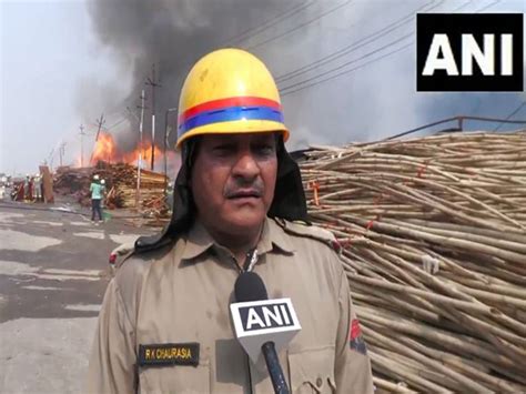 Uttar Pradesh: Firefighters battle massive blaze at tent house godown ...