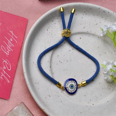Buy Niloofar Evil Eye Protection Rakhi Band Online in India - Mypoojabox.in