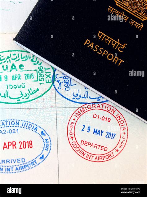 UAE visa stamping, united arab emirates and indian official stamps on a ...