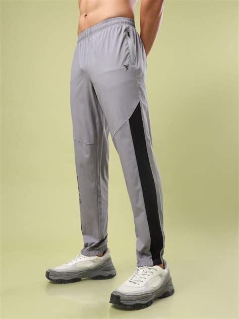 Men Solid Slim Fit Sports Joggers with TECHNOLITE
