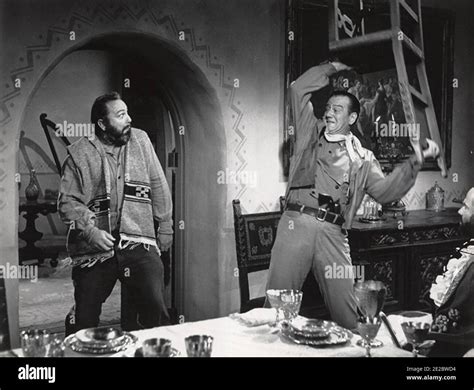 THE COMANCHEROS 1961 20th Century Fox film with John Wayne at right ...