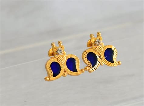 Gold tone blue-white kerala style mango earrings dj-47201 – dreamjwell