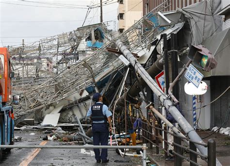 Strong typhoon slams western Japan; 2 dead, airport flooded - News US Today