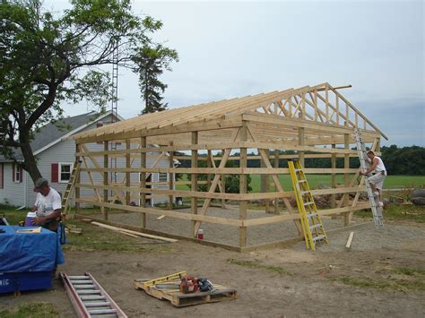 Trusses Raised - 24 x 30 pole barn garage construction - materials by ...