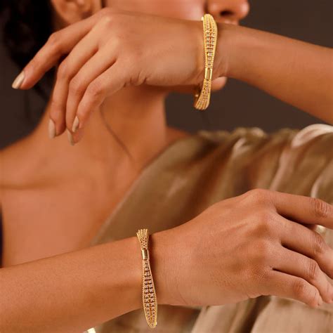 Gold Elegance Nayara Spark CZ Gold Bangles – VOYLLA
