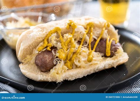 Cooking bratwurst stock photo. Image of vegetable, meat - 260721886