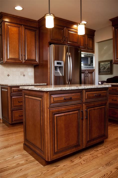 Beautiful maple stained cabinets with black glaze in this Plainfield ...