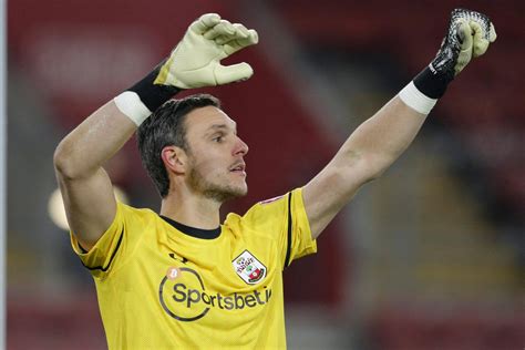 Download Alex McCarthy With Arms Up Wallpaper | Wallpapers.com