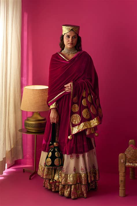 Nur Ivory block printed double layerd lehenga with silk velvet kalidar ...