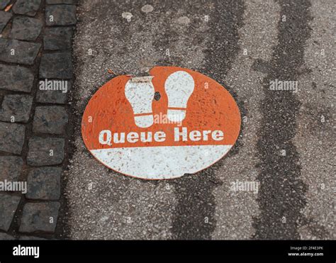 Image result for Queue This Way Sign