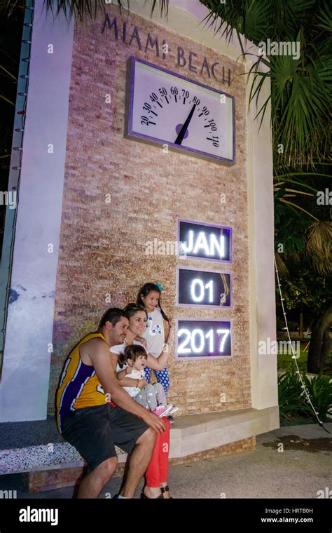 Miami Beach Florida,time temperature clock,Hispanic family posing,New ...