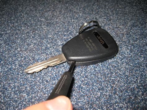 Program Key FOB 2010 Jeep Liberty 的图像结果