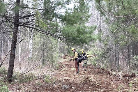 Rain, firefighters tame wildfire near Isabella - Duluth News Tribune ...