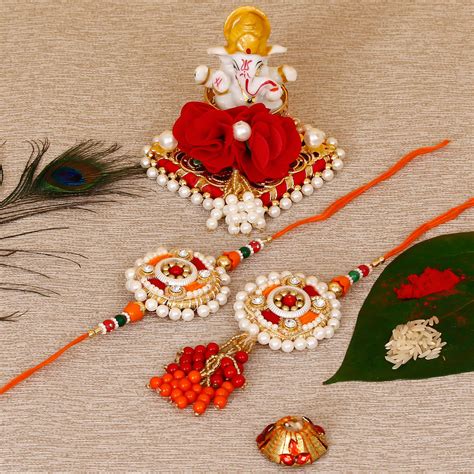 Designer Bhaiya Bhabhi Rakhi with Lord Ganesha Idol on Decorative Plate ...