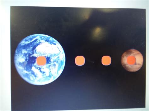 An unmanned spacecraft travels to Mars. Mars has a lower strength of ...