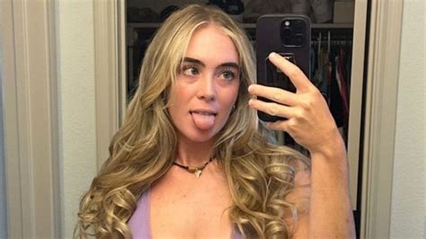 Grace Charis cheekily sticks tongue out in very busty top as golf influencer stuns in sexy ...