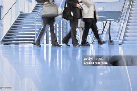 Business Men Walking in Line 的图像结果