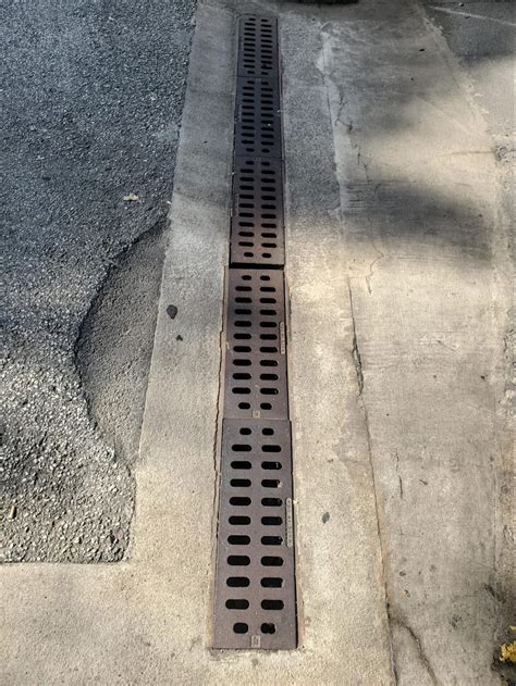 Trench drains in walkways and roadways - Infinity Design Soltions, LLC