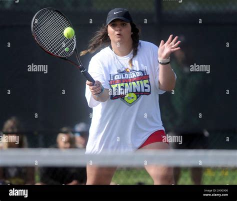 Eaton's Kadie Griffith returns a serve as she competes in the No. 4 ...