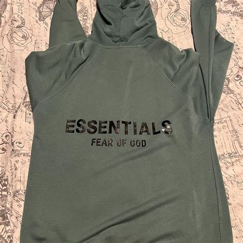 Essentials Hoodie Size L Green/mint colour Size... - Depop