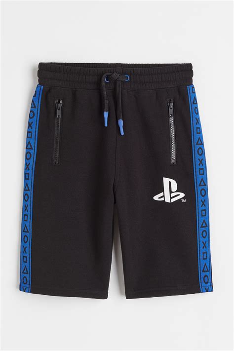 Printed sweatshorts - Black/PlayStation - Kids | H&M IN