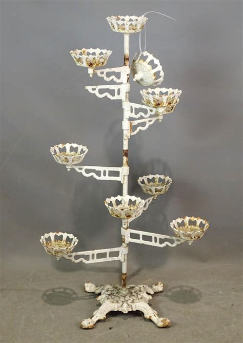 At Auction: Cast Iron Plant Stand
