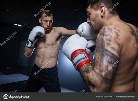 Two Men Boxing Stock Image 的图像结果