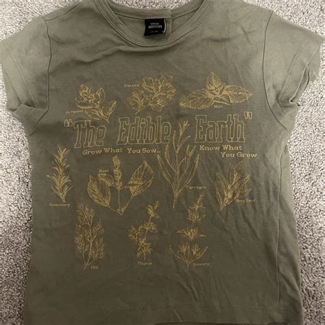 Olive green graphic baby tee #urban #graphictee #nature | Depop