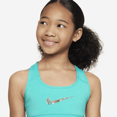 Nike Swoosh Older Kids' (Girls') Reversible Sports Bra. Nike IN