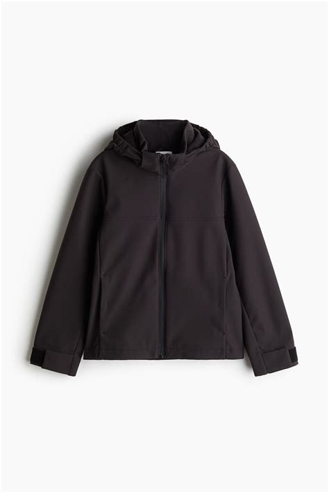 Water-repellent softshell jacket - Black - Kids | H&M IN