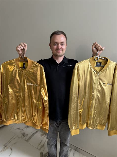 Just got a new design of the Golden Jacket Which one is better? The AWS ...