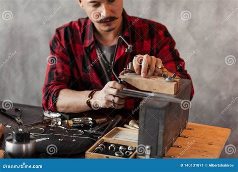 Jeweler Saws the Item at Workplace . Stock Image - Image of goldsmith ...